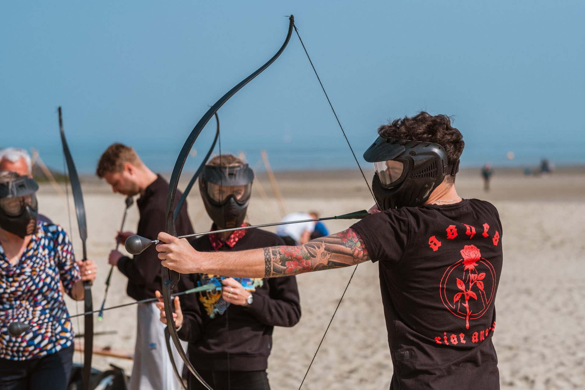 shoot out bedrijfsuitje strand